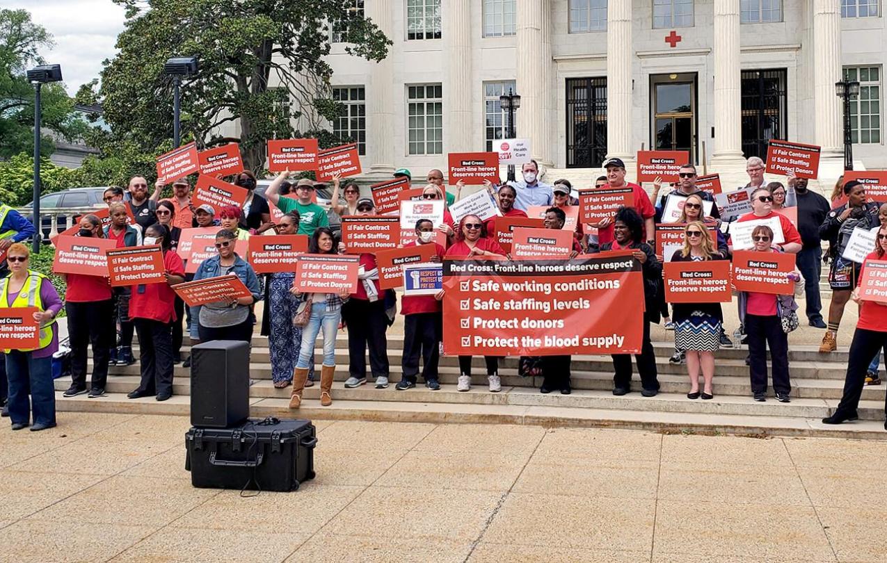 Workers rally against the American Red Cross. Photo credit: Omar Tewfik