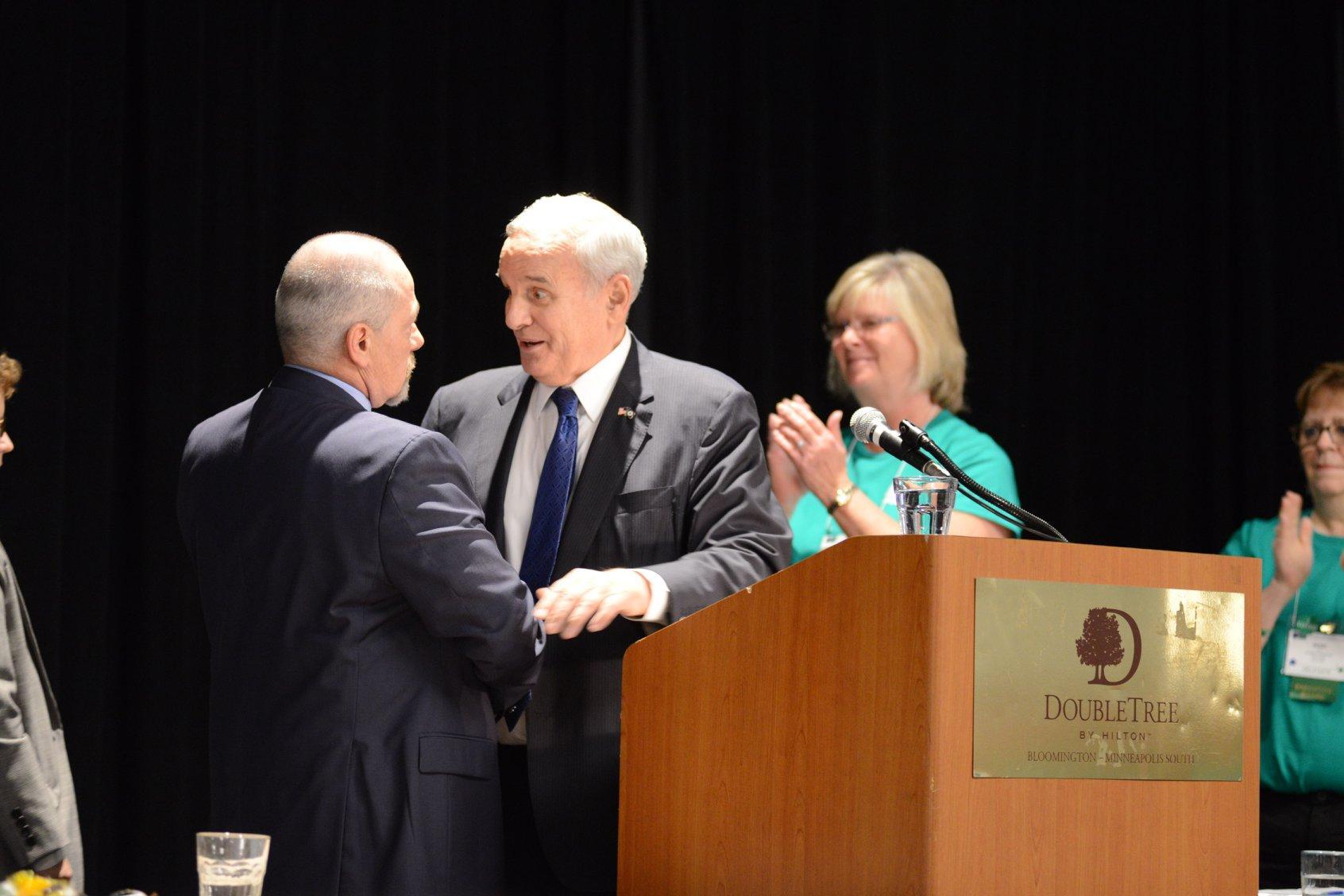 AFSCME Council 5 Executive Director John P. Westmoreland and President Judy Wahlberg bid farewell to retiring Governor Mark Dayton