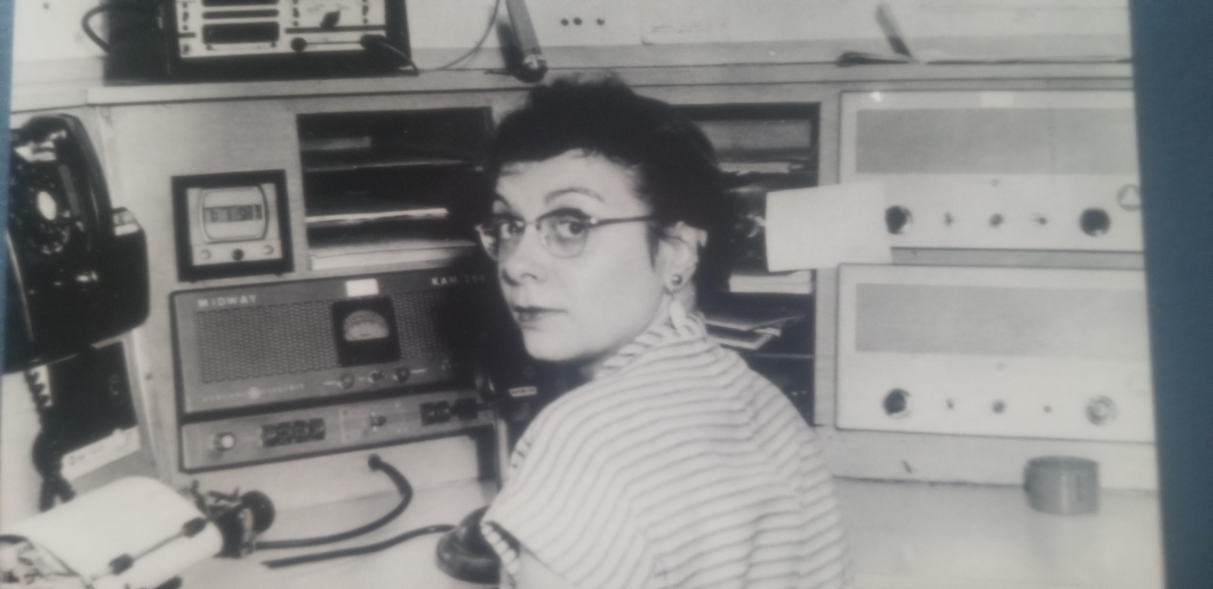 Mitzie Pernu at the radio while on the job as a 911 dispatcher in 1963